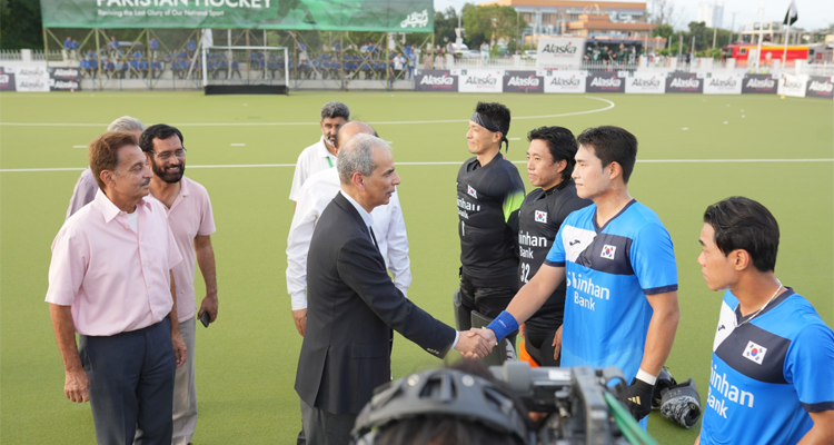 The Wafaqi Mohtasib, Mr. Naveed Kamran Baloch shaking hands with the South Korean players, prior to the beginning of Pakistan-South Korea Hockey match at the Naseer Bunda Hockey Stadium, Islamabad on 04.08.2026.