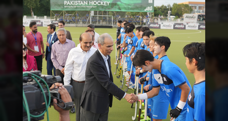 The Wafaqi Mohtasib, Mr. Naveed Kamran Baloch shaking hands with the South Korean players, prior to the beginning of Pakistan-South Korea Hockey match at the Naseer Bunda Hockey Stadium, Islamabad on 04.08.2026.